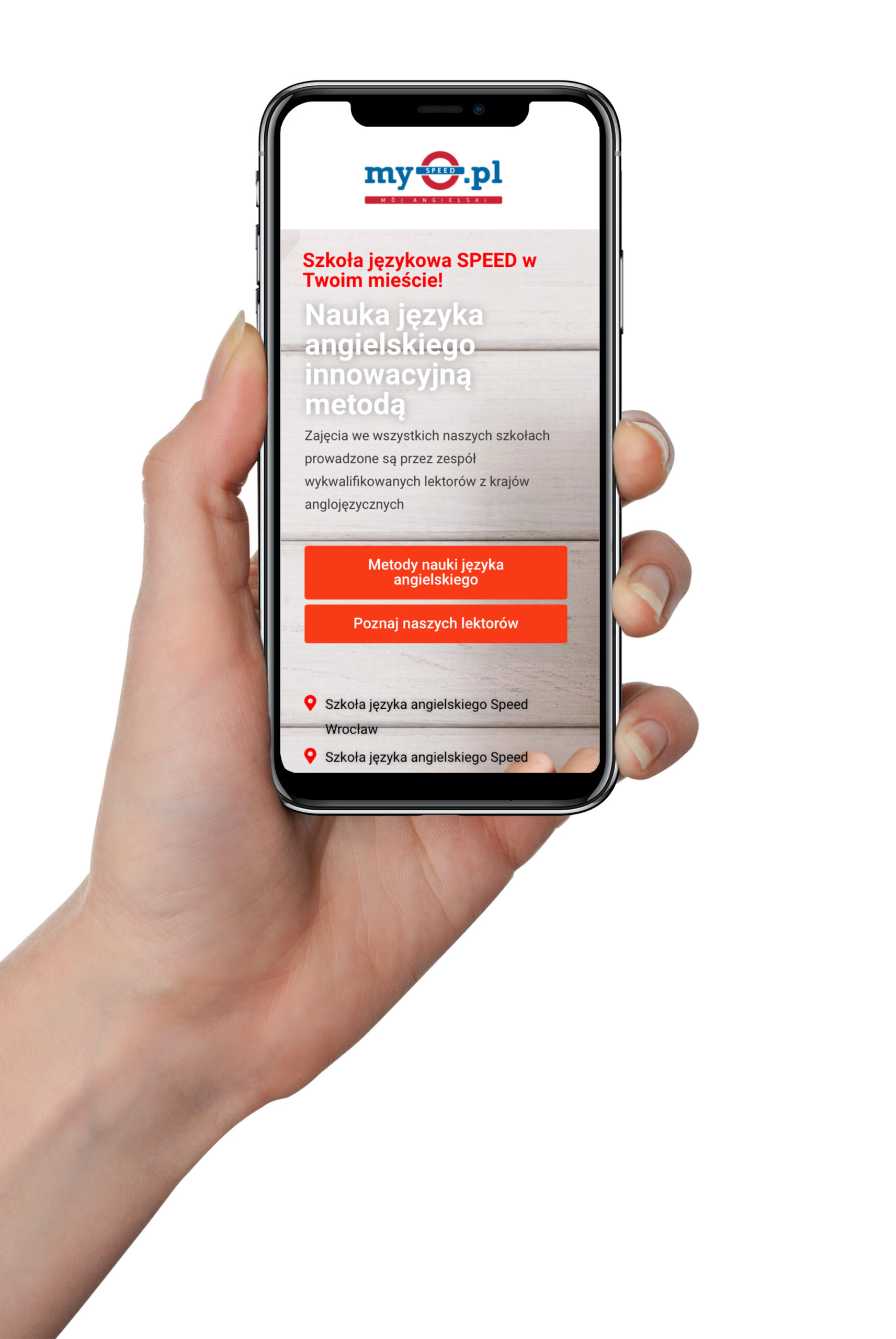 Osoba trzymająca telefon z wyświetloną stroną szkoły językowej oferującej kursy angielskiego